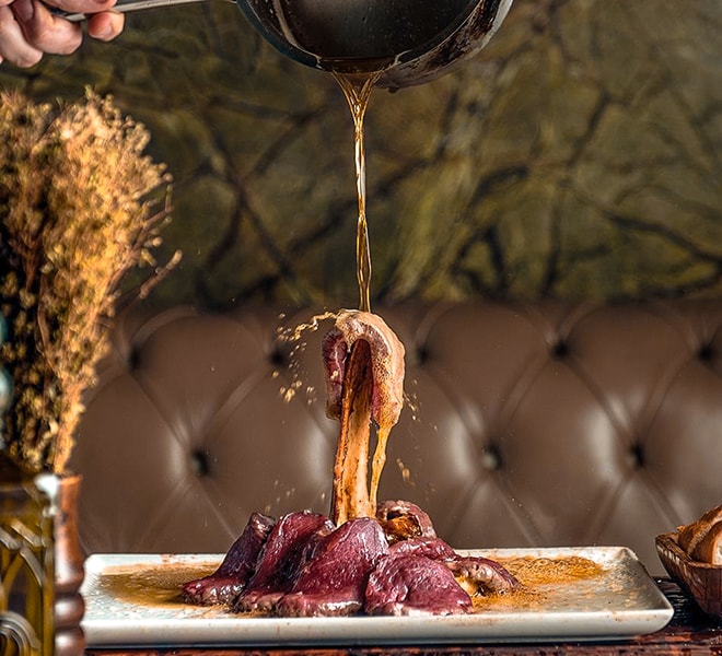 Nusr-Et dining room with warm lighting